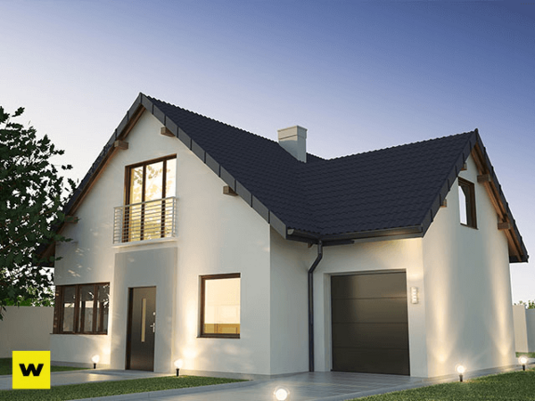 Modernes Einfamilienhaus mit Garage und Balkon bei Sonnenuntergang, Neubau Immobilie.